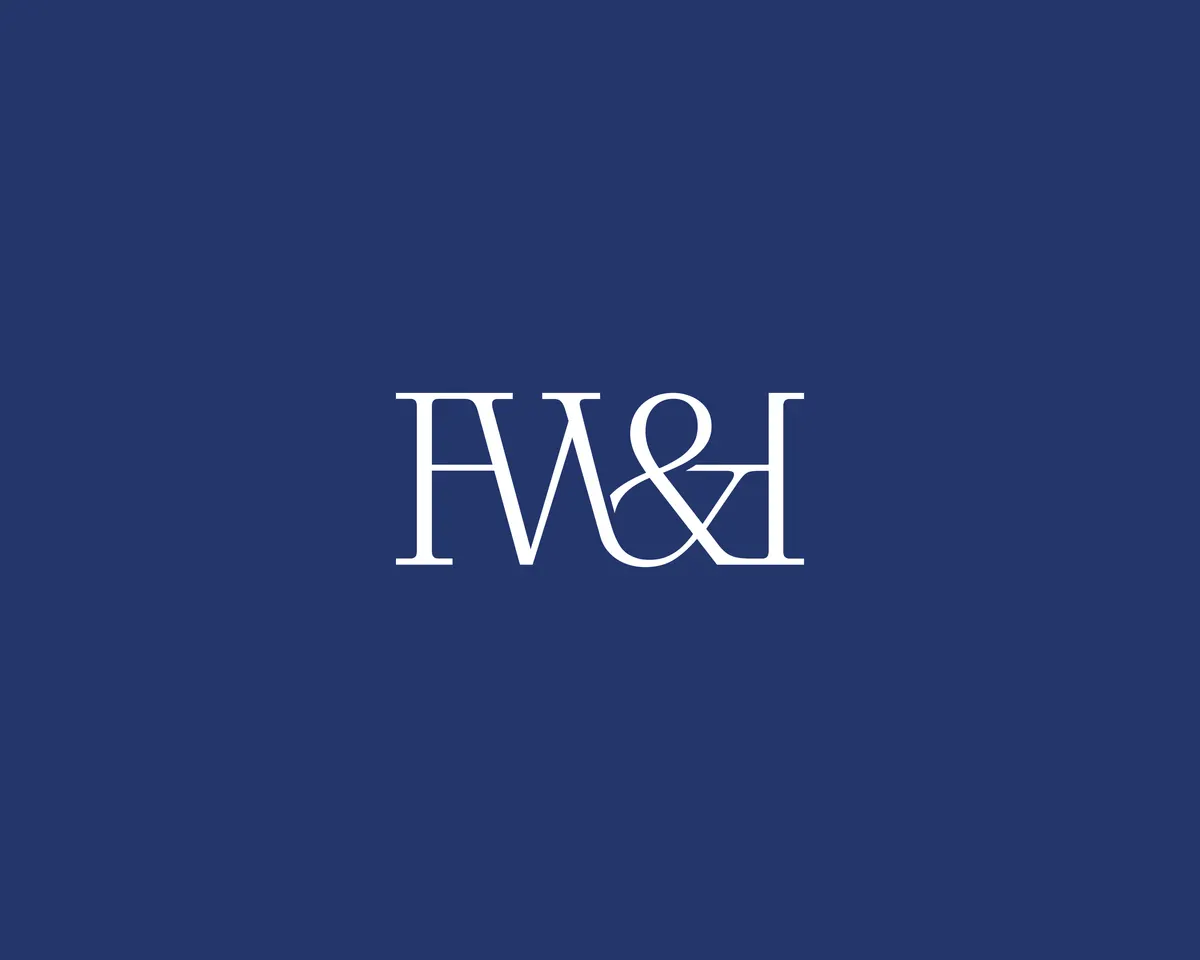 Proposition de logo HW&H en capitales serif, blanc sur fond bleu marine
