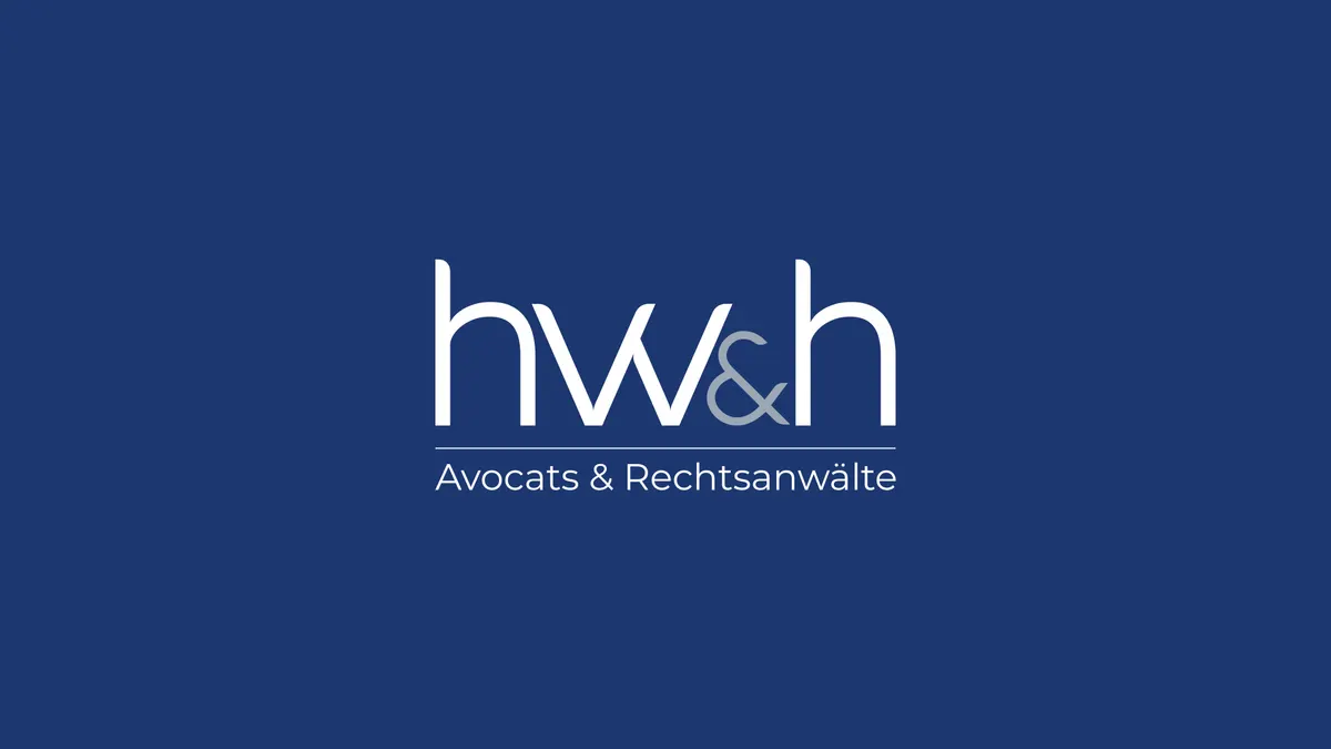 Logo hw&h Avocats & Rechtsanwälte, blanc sur fond bleu marine