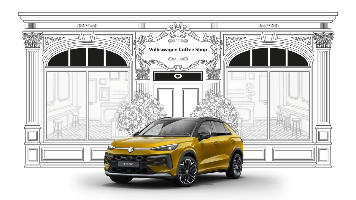 Illustration baroque en noir et blanc de la façade du Volkswagen Coffee Shop, avec le Nouveau T-Roc jaune au premier plan
